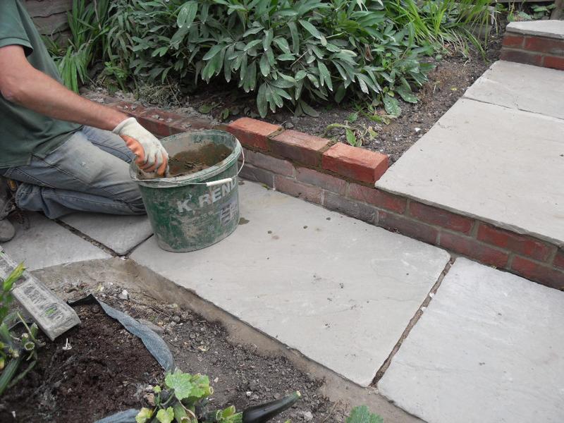 Bricks being laid behind the veg plot