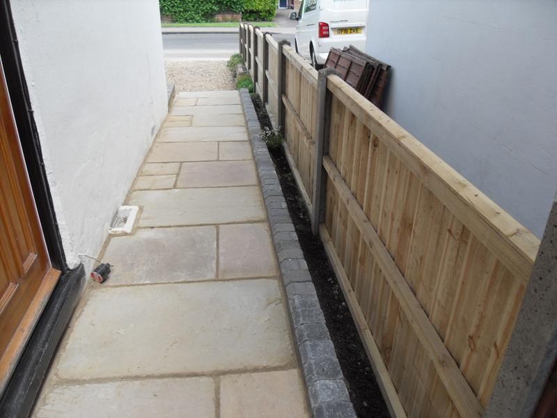 New fence panels beside our new path